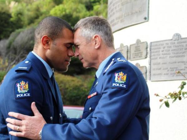 Commissioner Mike Bush welcomes new constable Selevasio Kora to the police family.