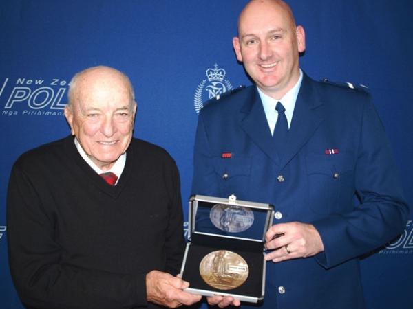 Graham McColl (Pvt McColl's nephew) and Senior Constable Karl Williams 