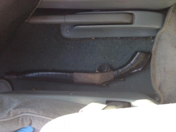The sawn-off shotgun found concealed between the seats