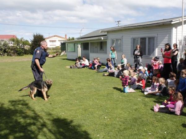 Dog Handler, Senior Constable Christian Hogan and Police puppy Jed entertain the crowd