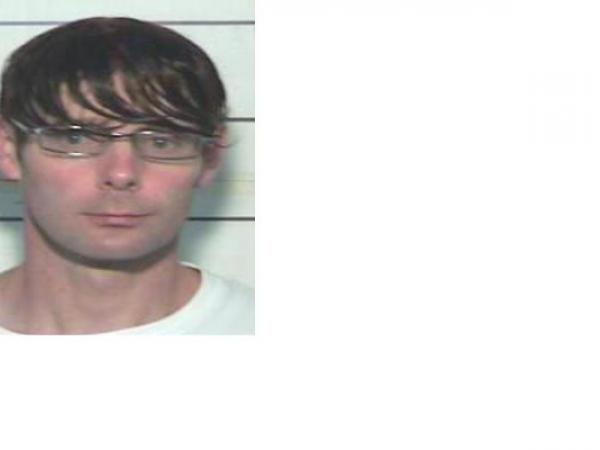 Phillip John Smith - is on the run and considered dangerous. If you see him, call Police.