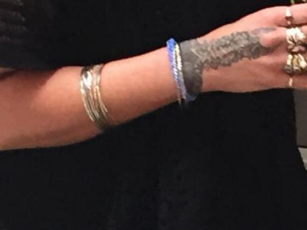 Tattoos on right hand 