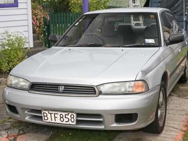 1999 silver Subaru Legacy sedan, registration BTF858