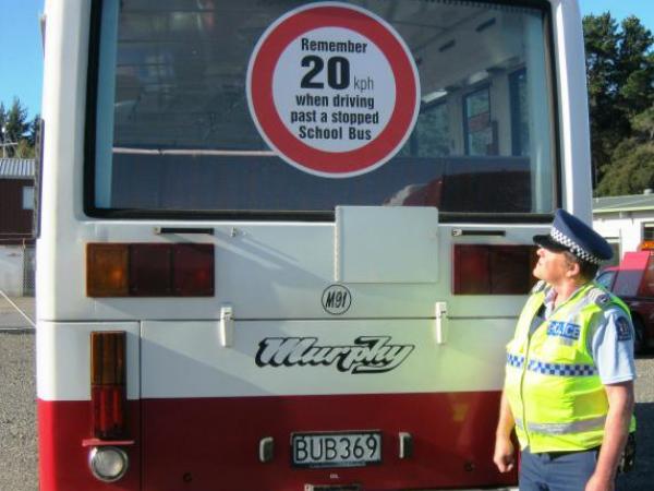 Thames Sergeant Jim Corbett keeps an eye on the speed limit around school buses