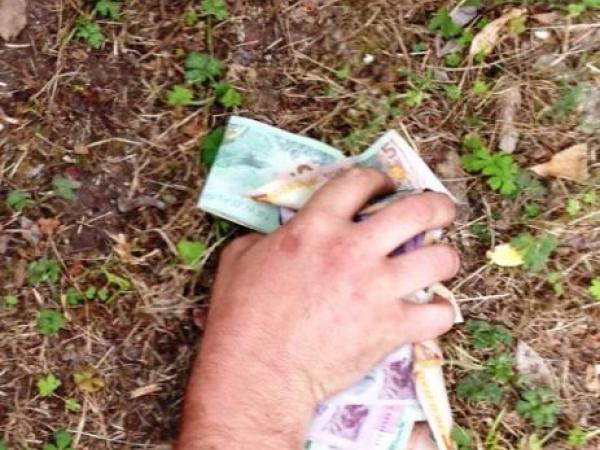 Cash the offender was still clutching as he was arrested