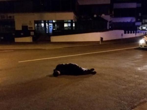 This man was found asleep in the middle of a road in central Napier.road.