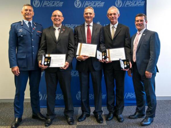 Police Minister and Commissioner with Meritorious Service Medal recipients