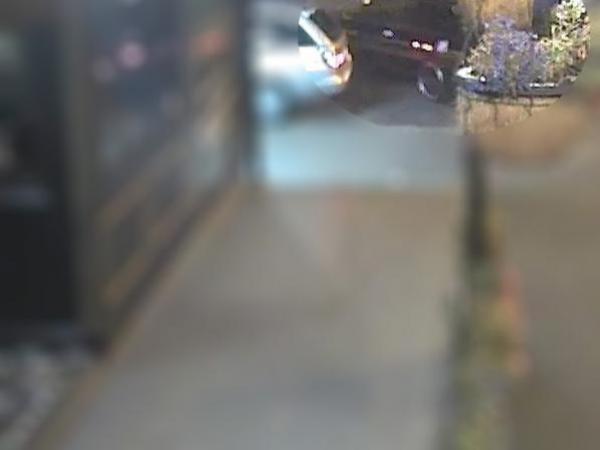 Can you help identify this black car?