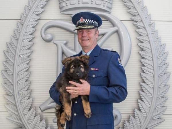 Superintendent John Price with 9 wk old Police puppy Wookie