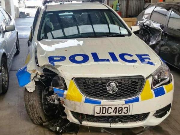 A view of the seriously damaged Police car