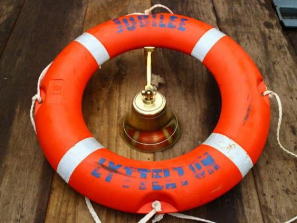 Ship's bell and lifebuoy recovered from the FV Jubilee by the Royal New Zealand Navy's Operational Diving Team