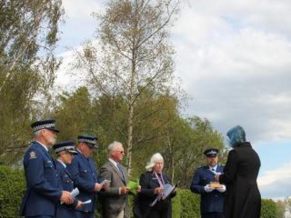 Sgt Bruce Dow, Insp Mel Aitken, S/Sgt Jason McCoy, Brian Collinge, Rev Carol Grant, Const Craig Bennet and Rowan Carroll.