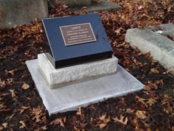 The memorial plaque erected by Police over the unmarked grave