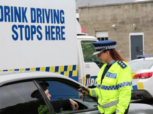 Inspector Tania Baron breath-tests a driver as part of a drink drive operation in Oamaru over the weekend.