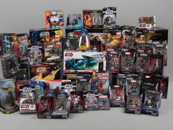 A large collection of Star Wars toys and figurines