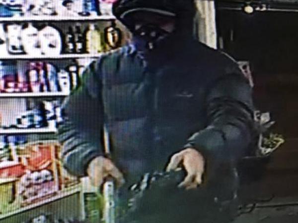 He had his face covered and threatened staff with a firearm