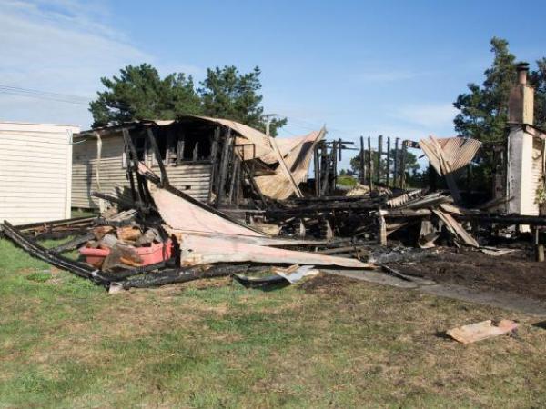 The remains of the Hokio Beach address which burnt down the day police announced our investigation.