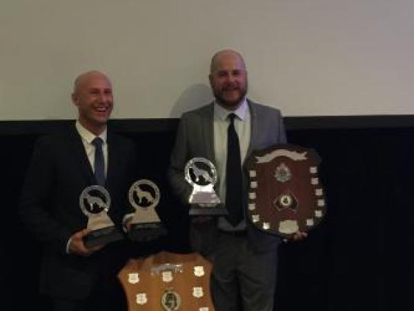 Senior Constables Owen Davies and Dave Robison with their trophies