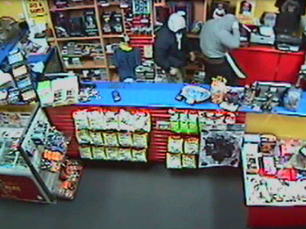 One of the offenders was carrying a large machete with a wooden handle.