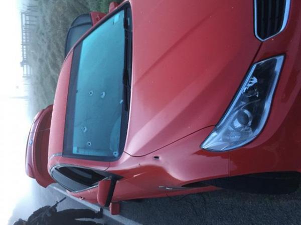 Scene photo - offending vehicle. A red, 2015 Holden Commodore. Rego: 1AZIF1