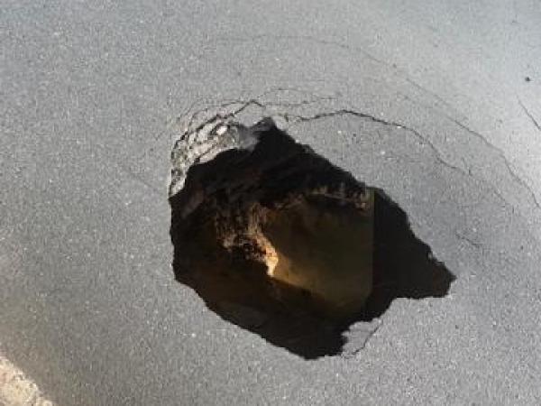 The whole road will be closed for the foreseeable future as council engineers assess the hole.