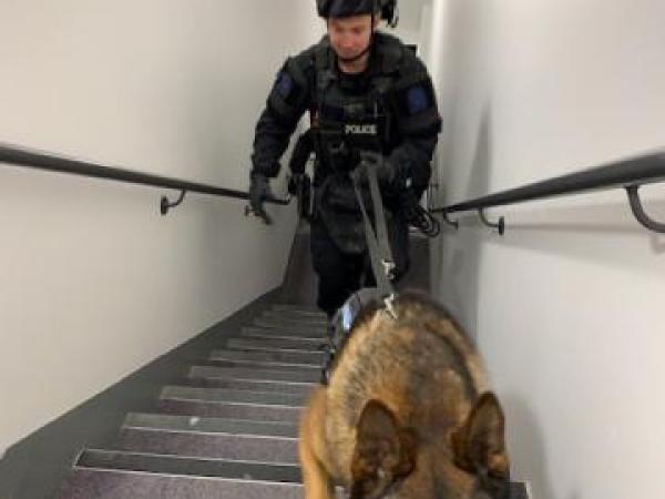 AOS Dog Handler Sam Bennett and Arlo
