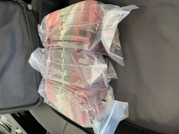 Police seized $250,000 at one address as part of Operation Menelaus.