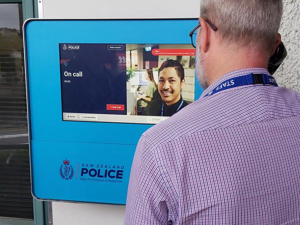 Photo of someone using Police Connect (outdoor)
