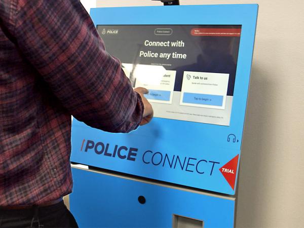 Photo of someone using Police Connect (indoor)