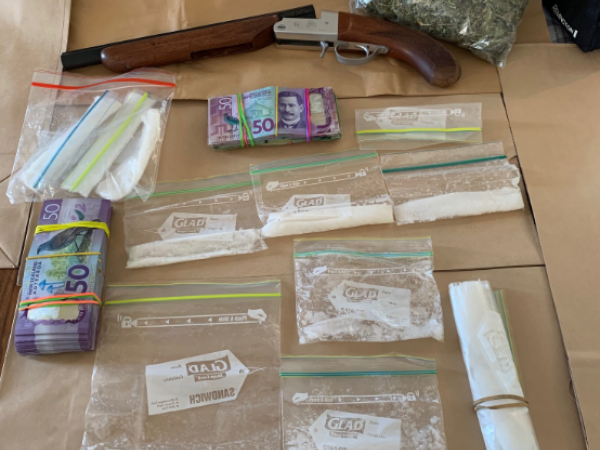 Police have seized firearms, drugs and cash. 