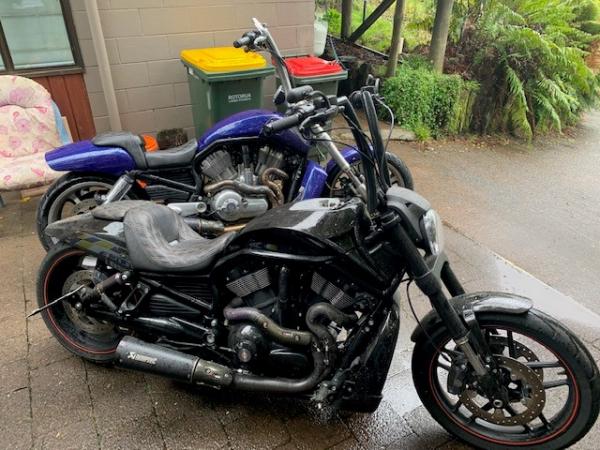 Two motorbikes outside a residential property