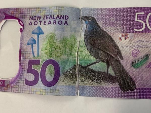 A counterfeit $50 banknote