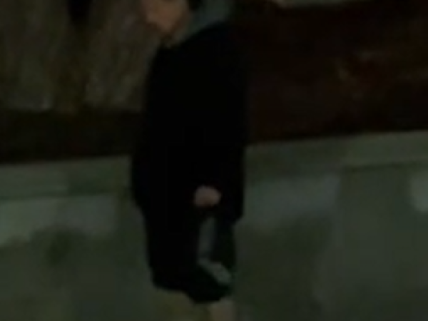 Man in shorts or black pants rolled up_1
