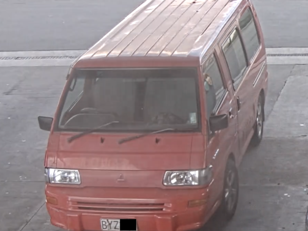 Red van sought by Police, front view