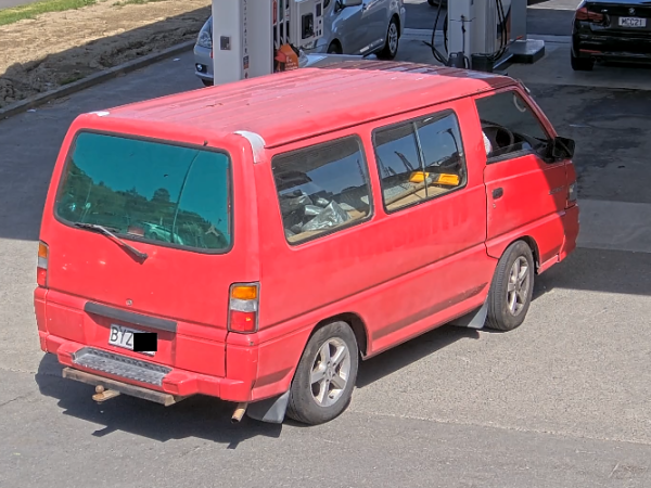 Red van sought by Police, rear view