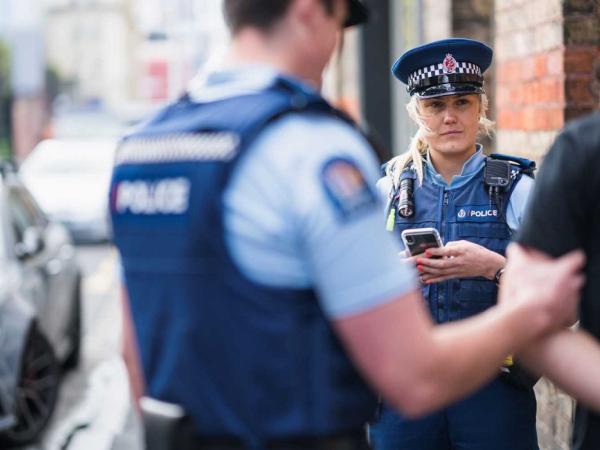 Officer with phone