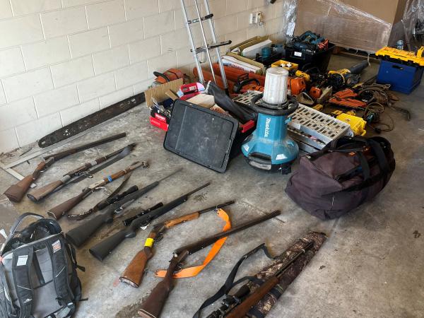 Some of the stolen property and firearms seized by Police. 