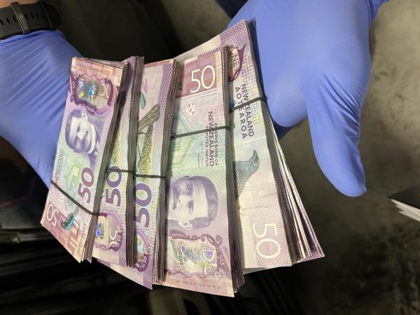Approximately $10,000 in cash was discovered in the vehicle