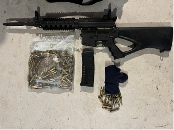 Police recovered a military-style semi-automatic rifle during a search warrant