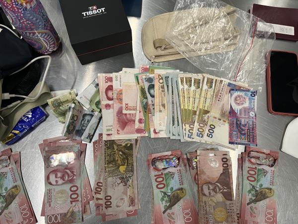 Money seized as a result of the three arrests. 