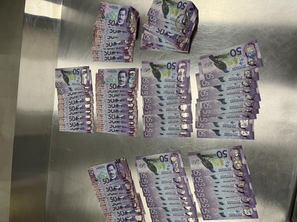 Money seized as a result of the three arrests. 