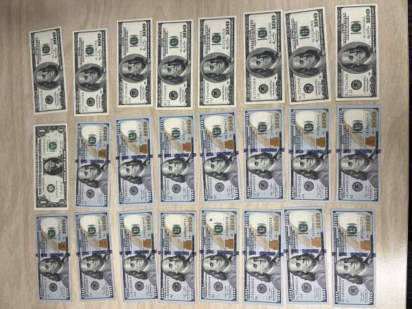 Money seized as a result of the three arrests. 