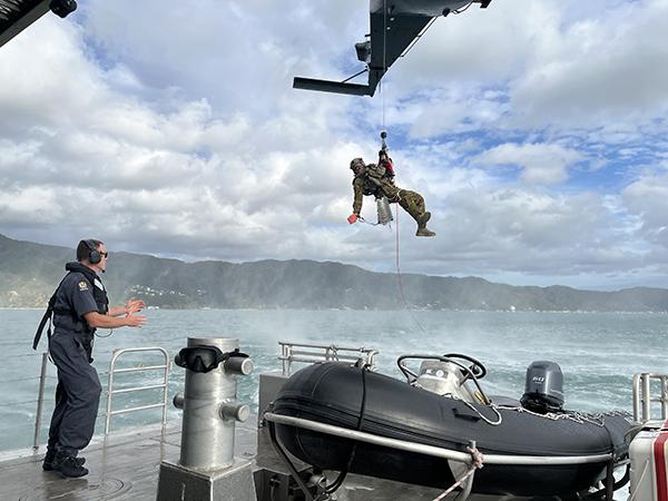 Wellington Maritime Unit with the Royal New Zealand Air Force during a training exercise to practice winching techniques.