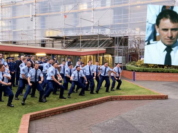 Recruits from Wing 328 pay tribute to Sergeant Derek Wootton (inset) at the Memorial Wall.