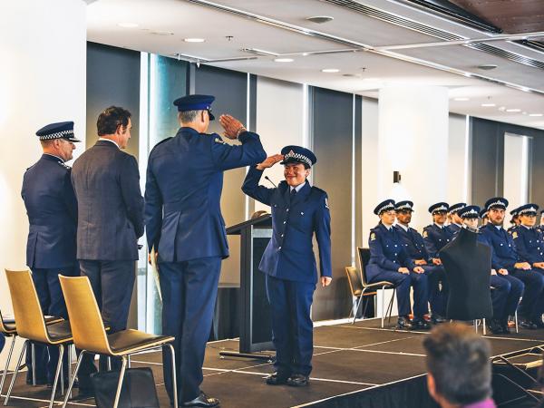 A photo of a new constable from Wing 333 saluting