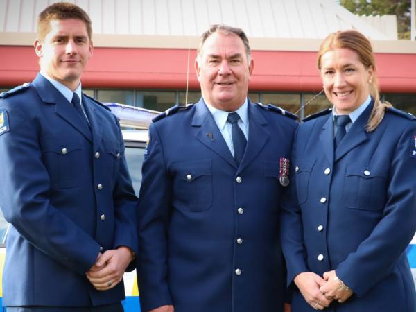 Senior Constable Ross Clarke with son Andrew and daughter Jessica.