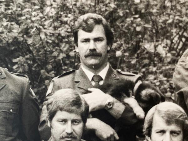 Back in the day: Ross (centre) with patrol dog-to-be Nasa.