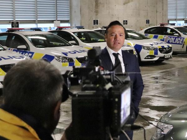 Rob Lemoto and the Police Ten 7 team filming at Wellington Central.