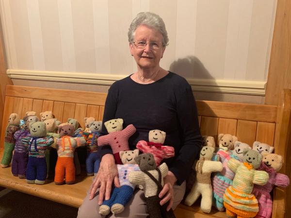 Senior Constable Jason Page's mum Anne with her group's care bears.