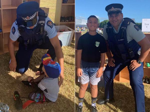 Tamariki receive a pair of pre-loved footy boots.